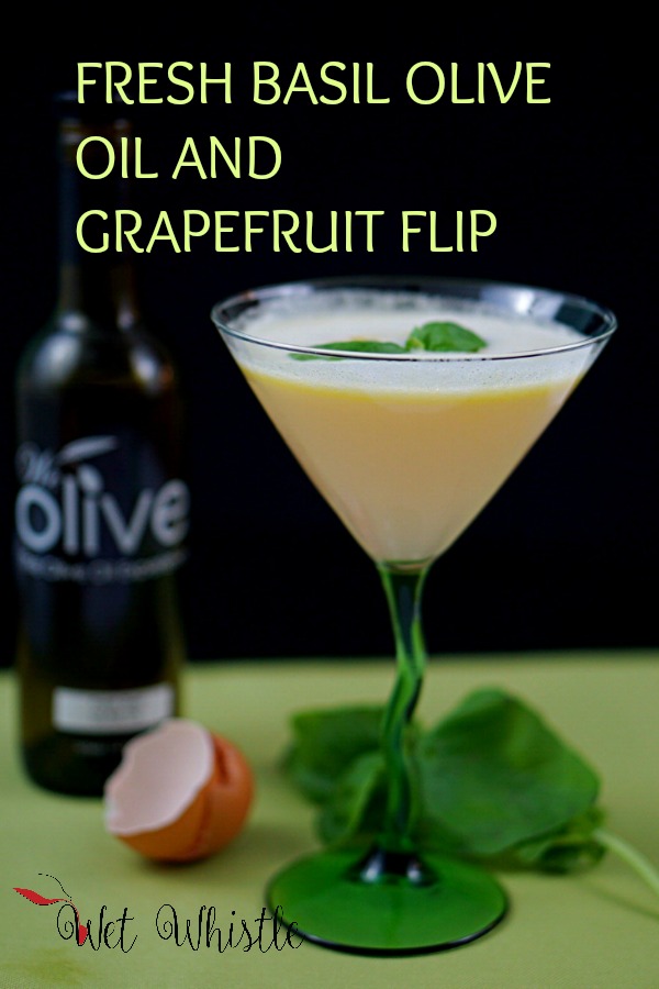 Fresh Basil Olive Oil is added to this cocktail to give it a distinct, herbaceous, lively, and rich flavor. Paired with grapefruit juice, an egg white, and gin makes this Flip light, airy, and unforgettable!~Wet Whistle Drinks by Darla Bentley