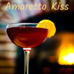 Cran-Cherry Amaretto Kiss has a unique twist of cherry juice to enhance the amaretto. It pulls the flavors together so that this drink dances across your tongue and makes your lips smile. .~By Wet Whistle Drinks by Darla Bentley