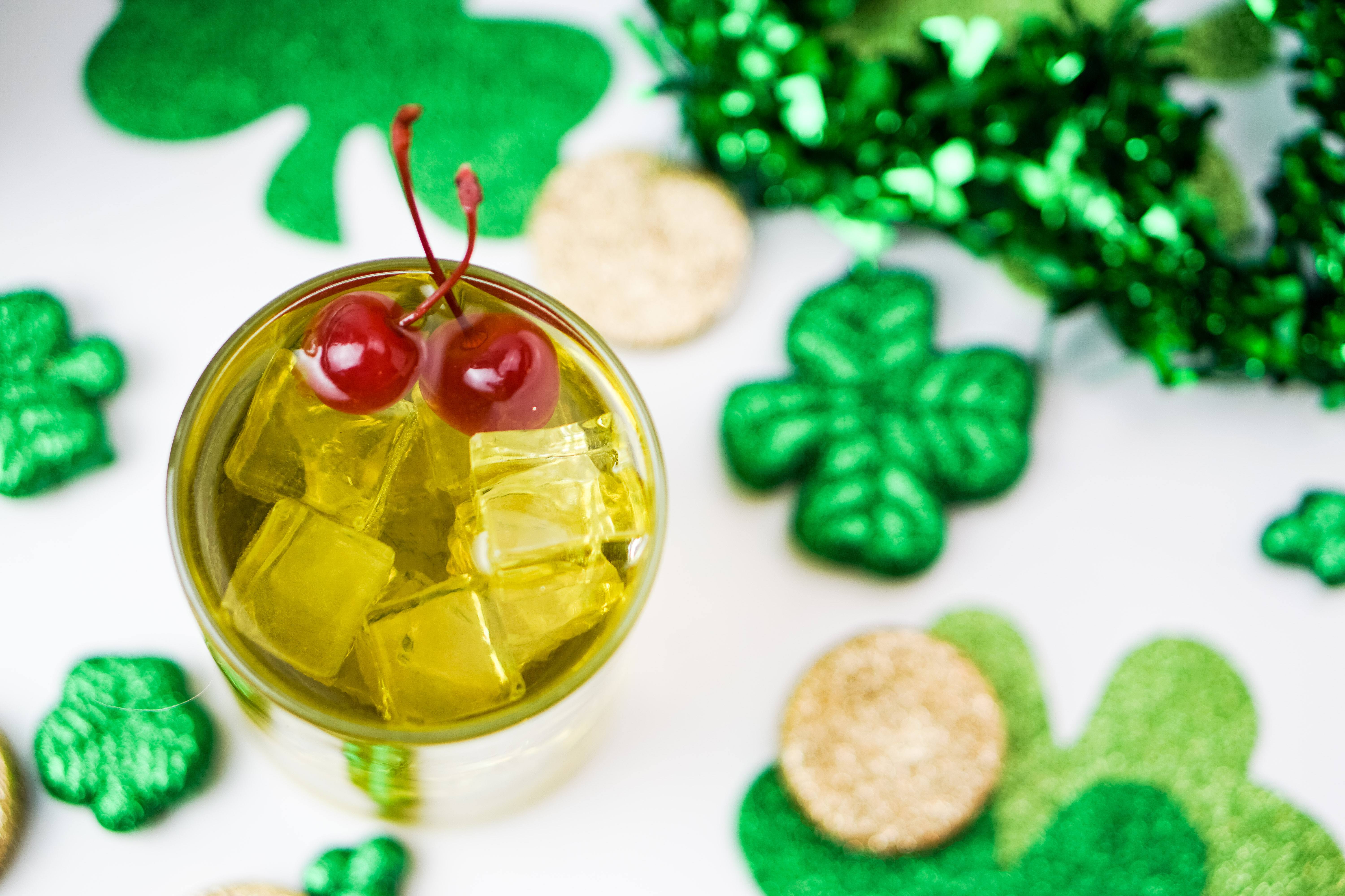 This Irish Whiskey and Melon cocktail will give you the Luck o' the Irish any time of the year! It is whiskey forward with undertones of sweet melon~Wet Whistle Drinks by Darla Bentley