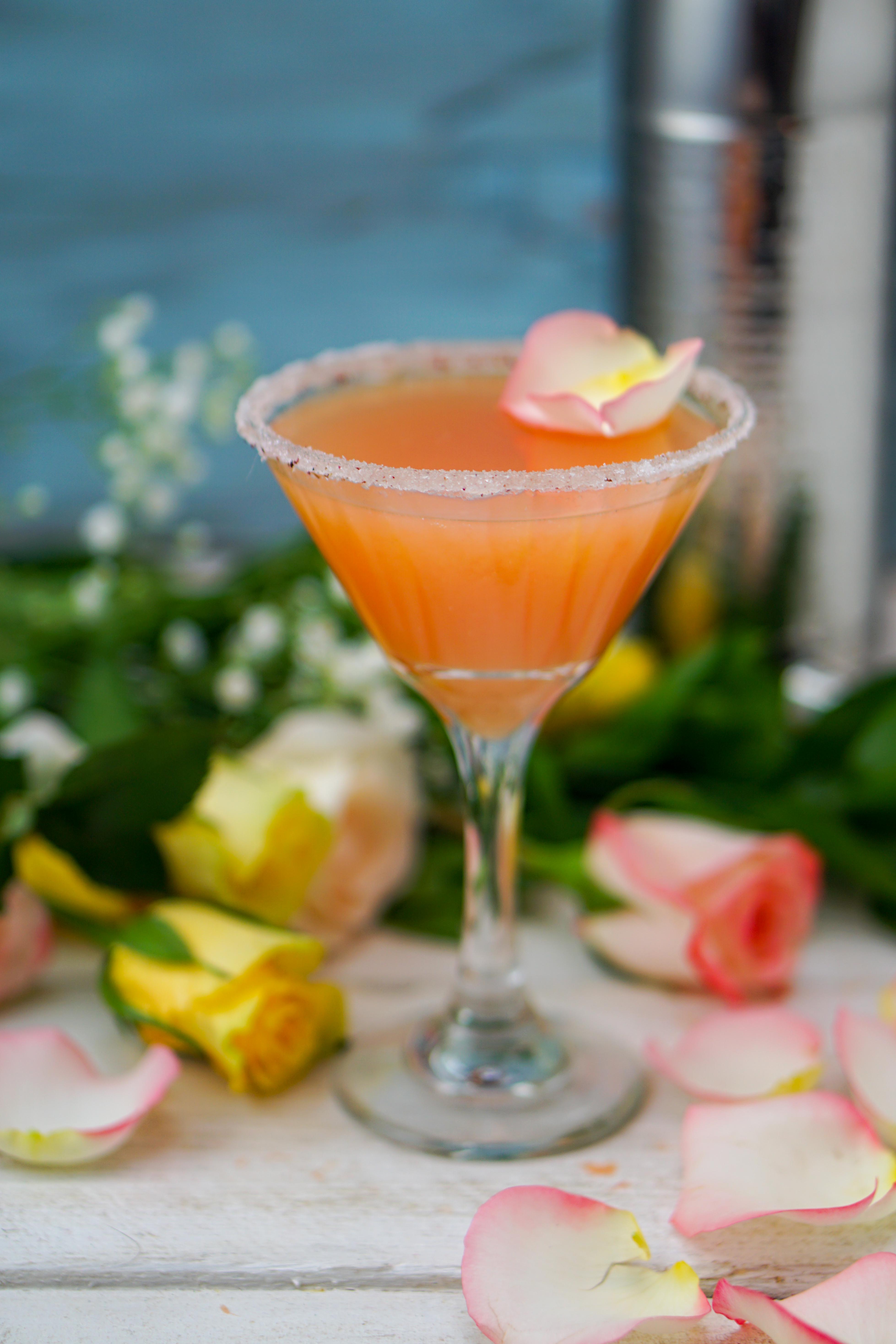 This fruity, floral cocktail will be a favorite at your warm weather gatherings! Enjoy the essence of summer with a Grapefruit Rose Martini~by Wet Whistle Drinks by Darla Bentley