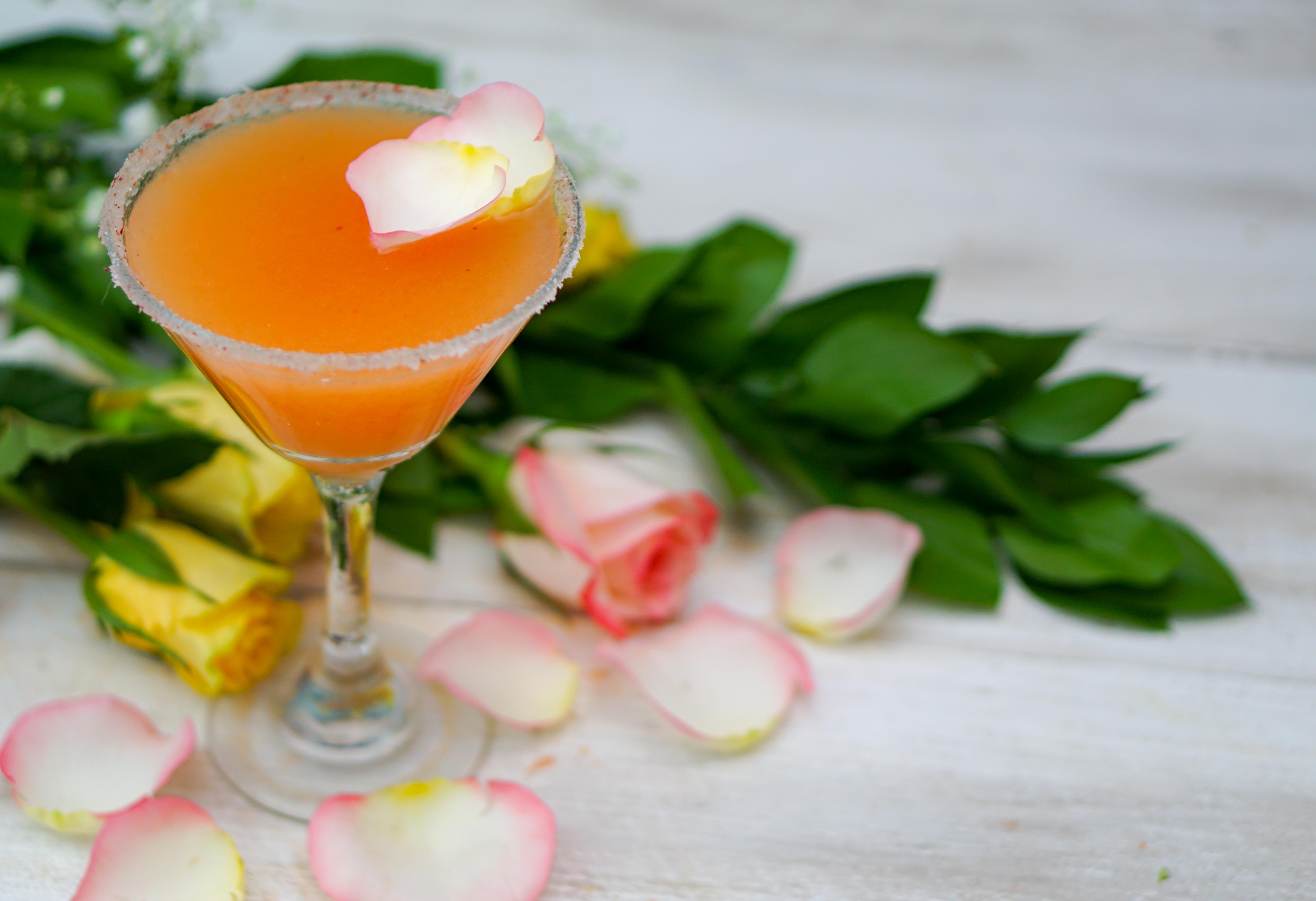 This fruity, floral cocktail will be a favorite at your warm weather gatherings! Enjoy the essence of summer with a Grapefruit Rose Martini~by Wet Whistle Drinks by Darla Bentley